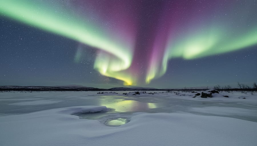 Green and purple northern lights aurora borealis over snowy Arctic landscape at night